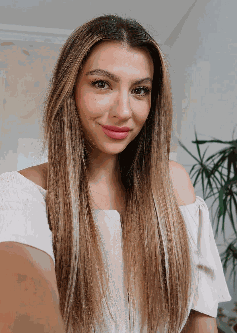 Woman wearing mixed colour halo hair extensions for natural highlights and lowlights without salon damage
